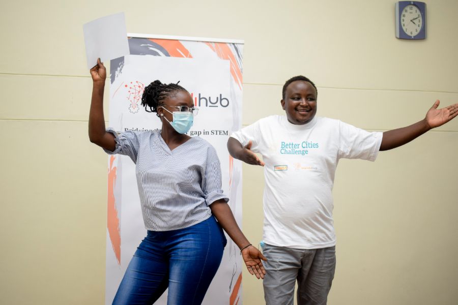 Better Cities Challenge trainer and Zuhura Innovations Africa Community Manager Intern doing a Celebratory dance