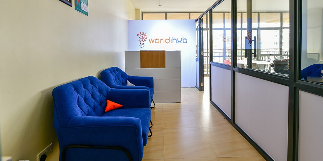 Image of the entrance of Waridi Hub where there is a registration desk